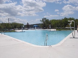 Poconos PA Vacation Home For Rent - One of 3 heated pools, Island pool has a zero entry end and snack bar